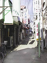 An alleyway with shops